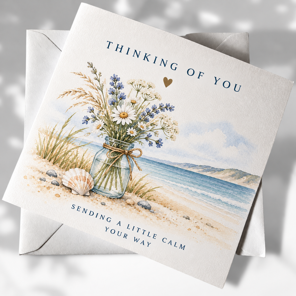 Thinking of You coastal greeting card with wildflower bouquet and seaside illustration