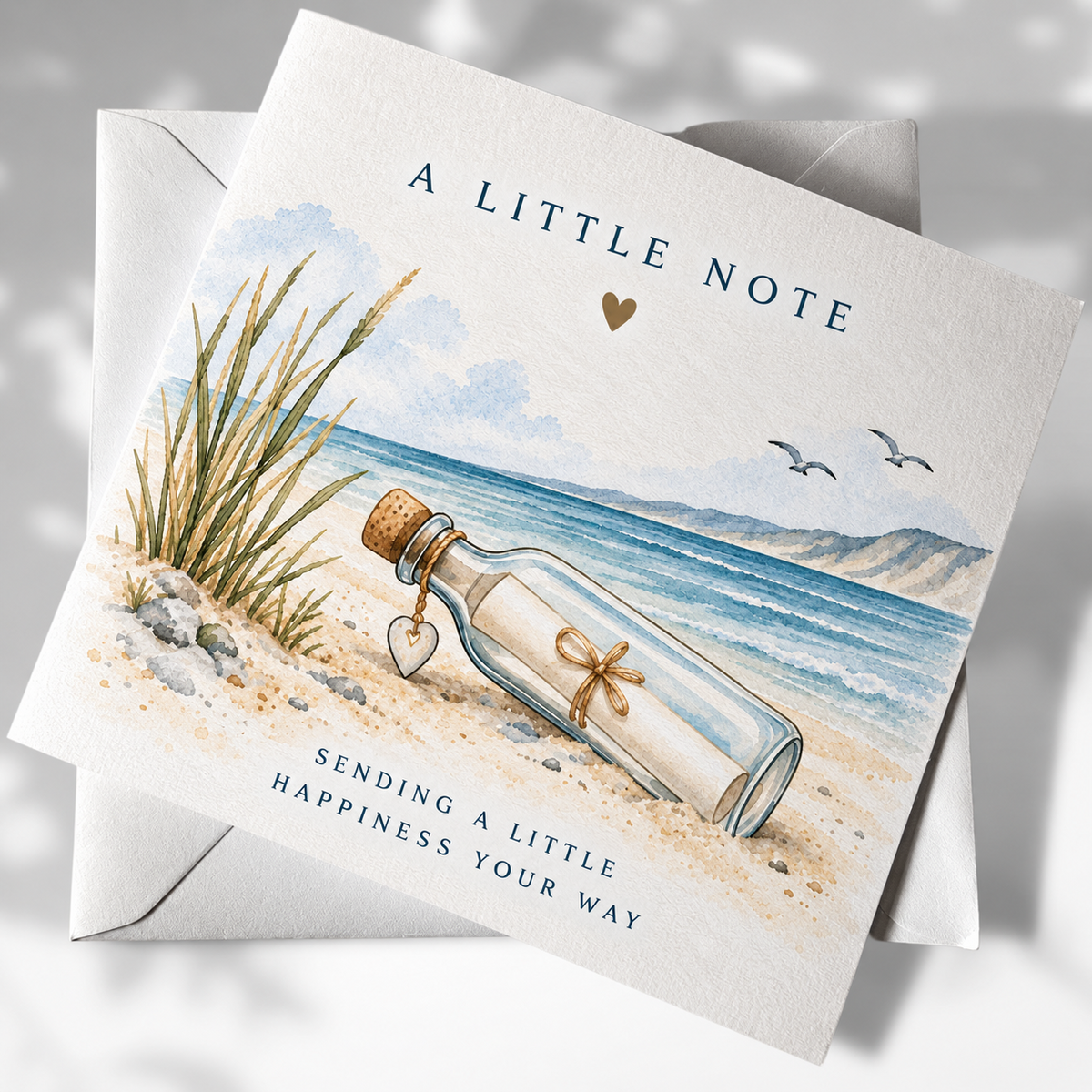 A Little Note coastal greeting card with message in a bottle illustration and envelope