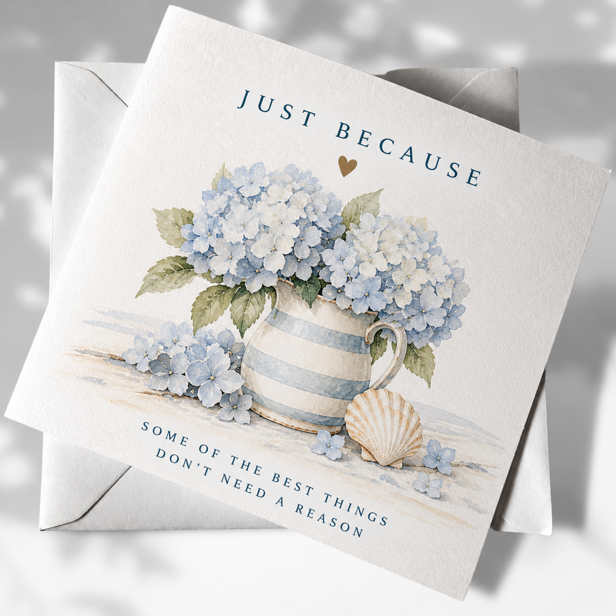 Just Because coastal greeting card with blue hydrangeas in a striped jug and shell illustration