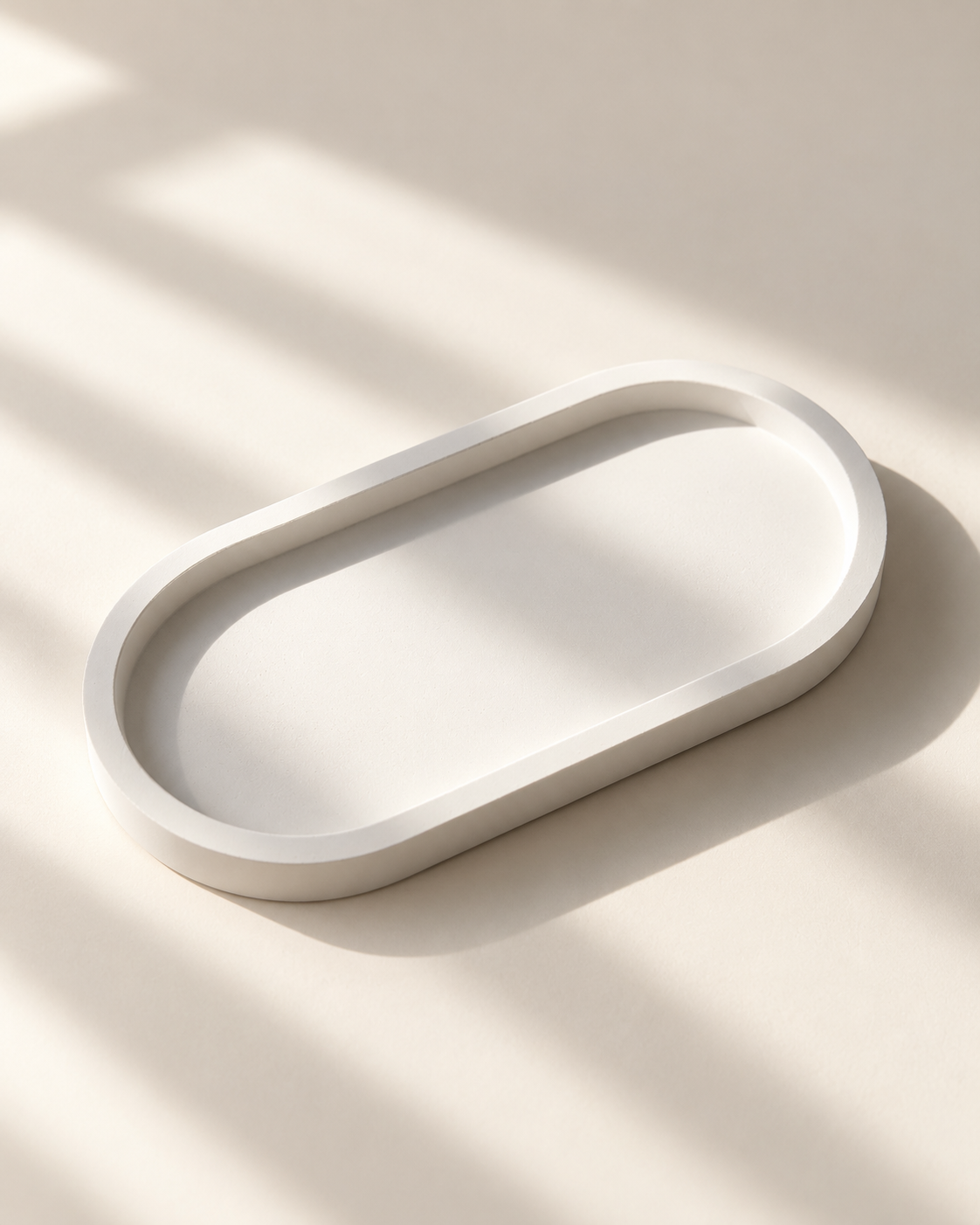 White stone oval tray in soft natural light